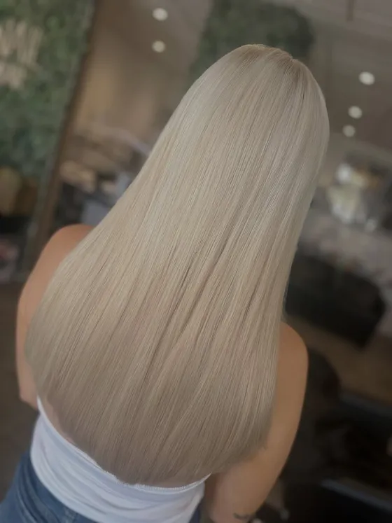Long ice-blonde colour and blow dry